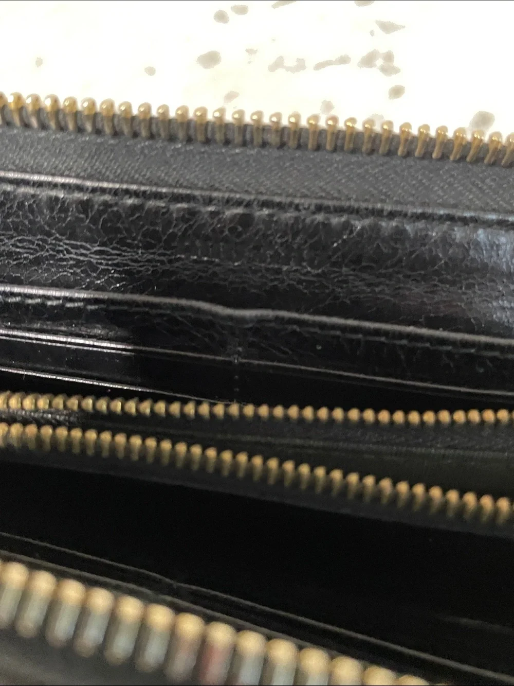 Miu Miu Black Quilted Zip-Around Wallet with Gold Logo
